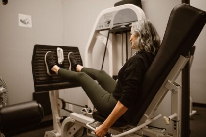 Woman working out on a leg press machine
